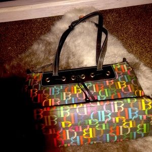 Dooney Bourke Black LB74 large zip top bag.